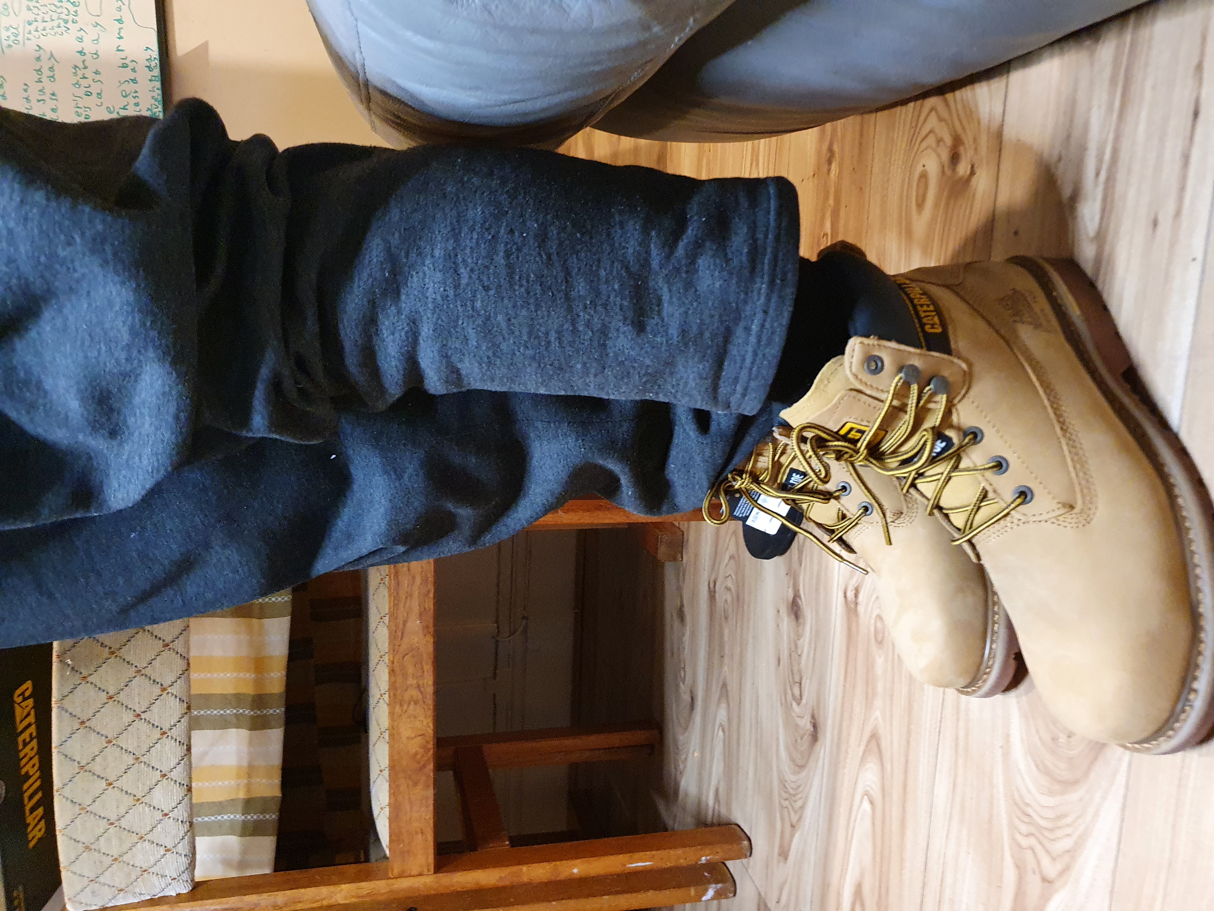 These are a pair of steel toe work boots made by Caterpillar. The model is Second Shift.